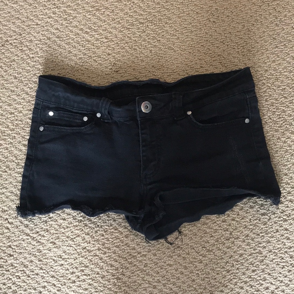 Black ripped shorts